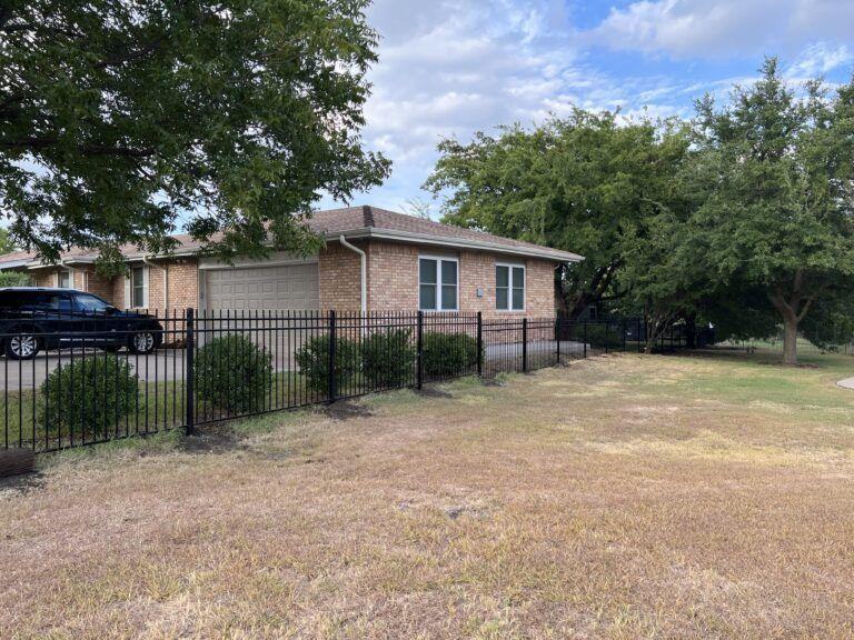 Five foot iron fence with decorative topper