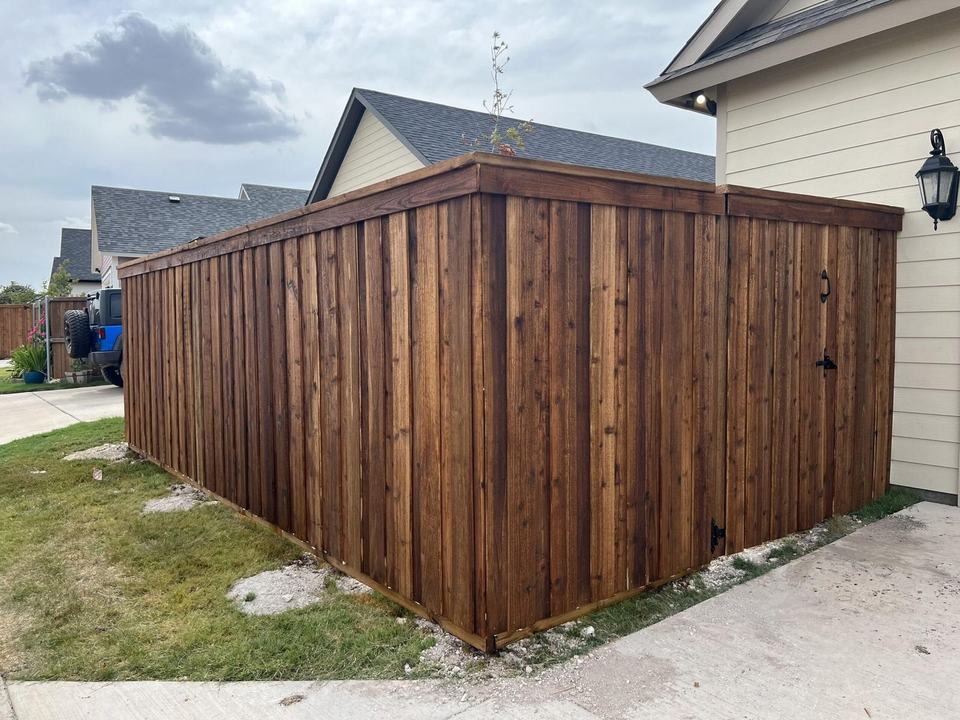 Stained board-on-board cedar privacy fence